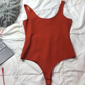 CUTE BURNT ORANGE BODY SUIT🍊